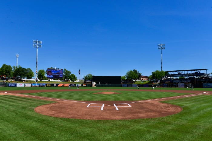 The SF Giants and Texas Rangers warm up before a game at Scottsdale Stadium. (2022)